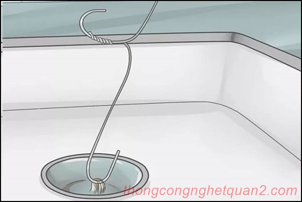 Dụng cụ th&ocirc;ng cống bằng m&oacute;c phơi đồ